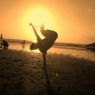 See Sunrise with One stand at Teluk Penyu Beach Cilacap